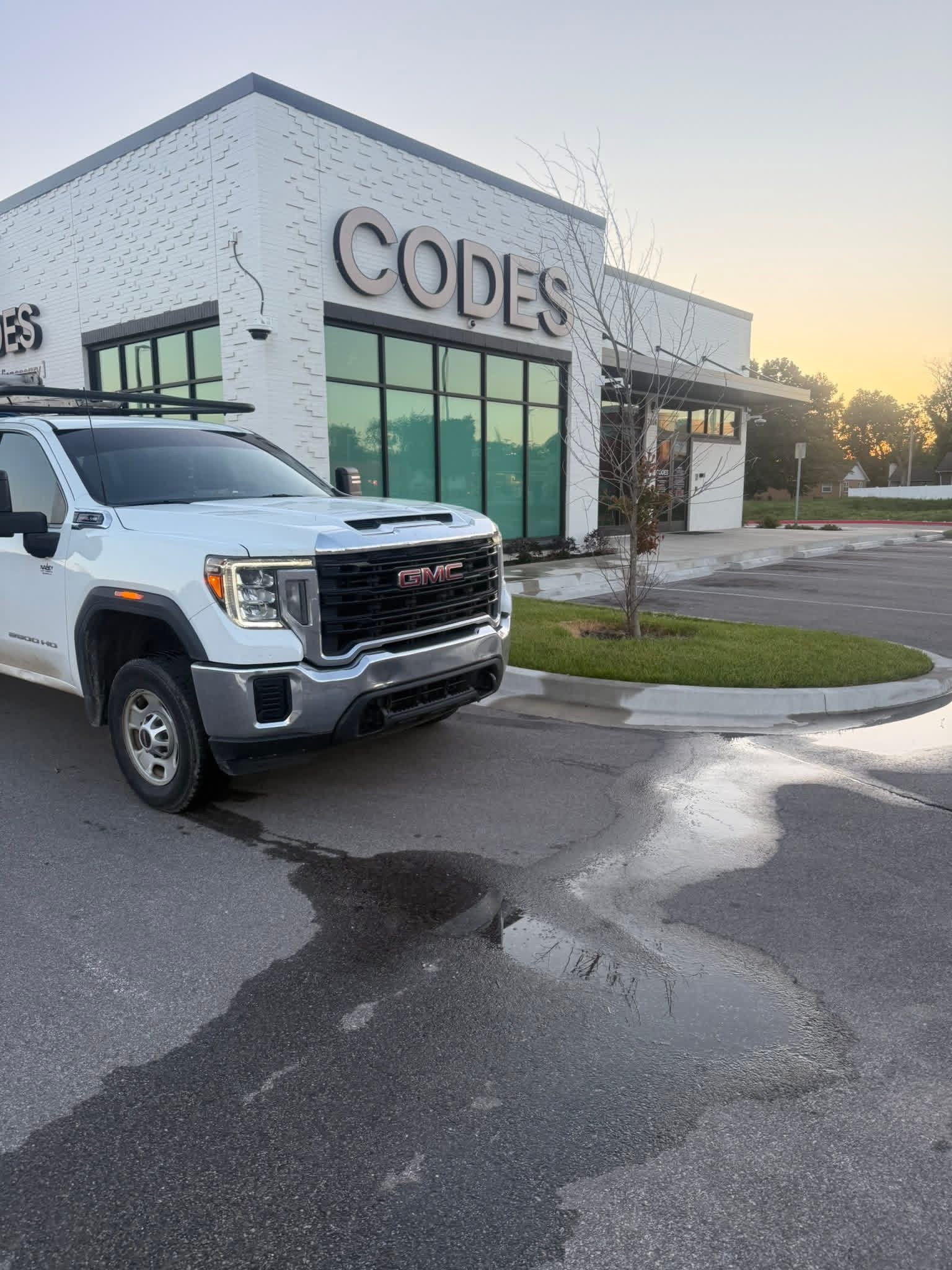 United Pressure Washing truck outside Codes Dispensary after commercial exterior cleaning in Sedalia
